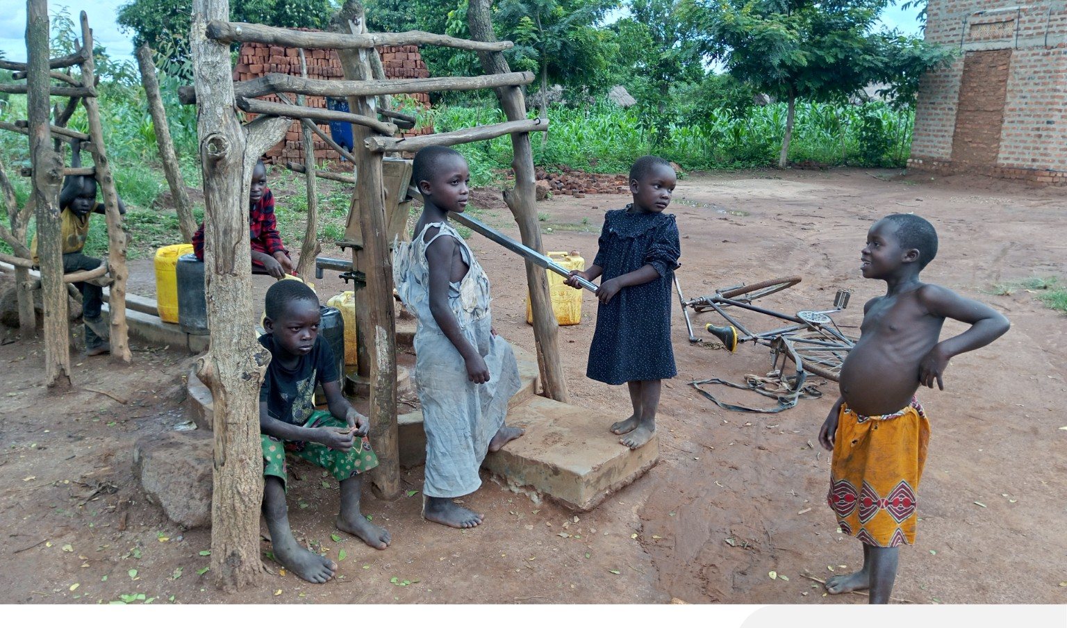 Community members and children during outreach