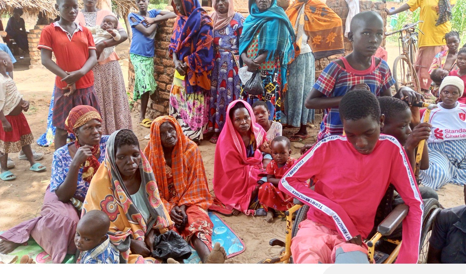Women, children and families gathered together